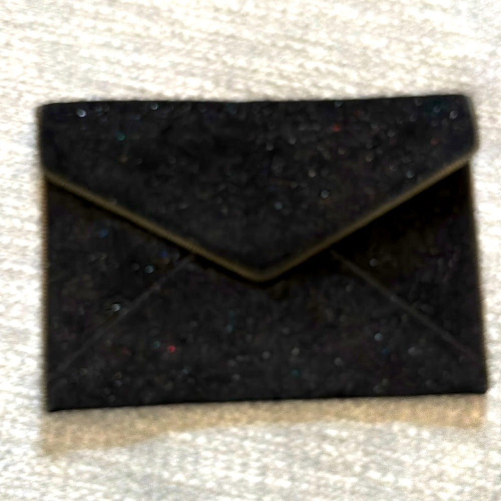 NWOT- REBECCA MINKOFF Black Sparkle Leather Envelope purse. 8” x 11” Zipper edge